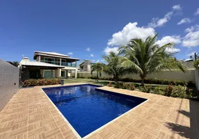 Foto 1 de Casa de Condomínio com 4 Quartos à venda, 250m² em Barra do Jacuípe, Camaçari