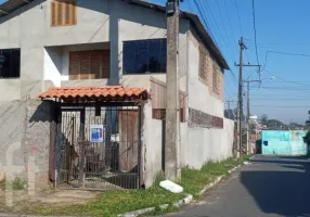 Foto 1 de Casa com 6 Quartos à venda, 150m² em Guajuviras, Canoas