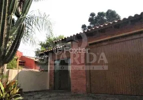 Foto 1 de Casa com 3 Quartos à venda, 132m² em Cavalhada, Porto Alegre