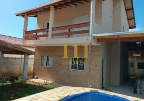 Foto 1 de Casa de Condomínio com 5 Quartos à venda, 250m² em Massaguaçu, Caraguatatuba