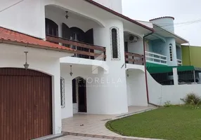 Foto 1 de Casa com 4 Quartos à venda, 279m² em Barreiros, São José