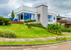 Foto 1 de Casa de Condomínio com 3 Quartos à venda, 259m² em Alphaville, Porto Alegre