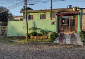 Foto 1 de Casa com 4 Quartos à venda, 240m² em Krahe, Viamão