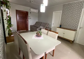 Foto 1 de Casa com 2 Quartos à venda, 126m² em Mário Quintana, Porto Alegre