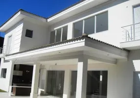 Foto 1 de Casa de Condomínio com 4 Quartos à venda, 330m² em Balneário Praia do Pernambuco, Guarujá