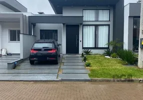 Foto 1 de Casa de Condomínio com 3 Quartos à venda, 87m² em Caminho do Meio, Viamão