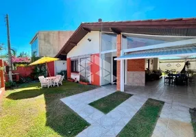 Foto 1 de Casa com 3 Quartos à venda, 105m² em Atlantida Sul, Osório
