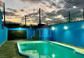 Foto 1 de Casa com 2 Quartos à venda, 80m² em Balneario Itaguai, Mongaguá