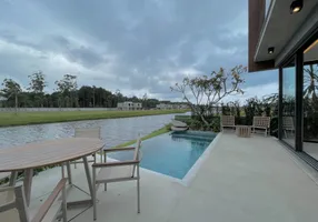Foto 1 de Casa de Condomínio com 4 Quartos à venda, 267m² em Atlantida, Xangri-lá