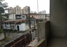 Foto 1 de Casa de Condomínio com 3 Quartos à venda, 84m² em Areia Branca, Santos