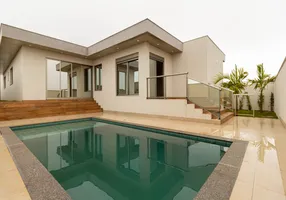 Foto 1 de Casa de Condomínio com 4 Quartos à venda, 254m² em Costa Laguna, Nova Lima