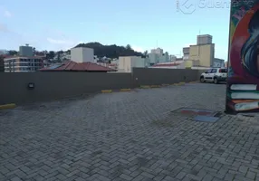 Foto 1 de Prédio Comercial com 11 Quartos à venda, 420m² em Carvoeira, Florianópolis