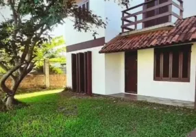 Foto 1 de Casa com 5 Quartos à venda, 132m² em Zona Nova, Tramandaí