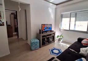 Foto 1 de Apartamento com 2 Quartos à venda, 54m² em Camaquã, Porto Alegre