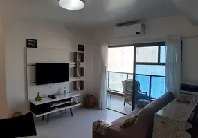 Foto 1 de Flat com 2 Quartos à venda, 66m² em Pitangueiras, Guarujá