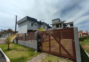Foto 1 de Casa com 2 Quartos à venda, 110m² em Quinta dos Açores, Garopaba