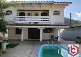 Foto 1 de Casa com 3 Quartos para alugar, 130m² em Jardim Guaiúba, Guarujá