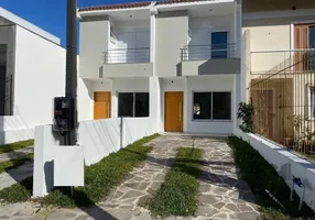 Foto 1 de Casa com 3 Quartos à venda, 127m² em Guarujá, Porto Alegre