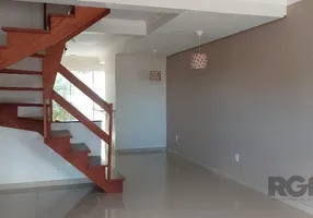 Foto 1 de Sobrado com 3 Quartos à venda, 119m² em Guarujá, Porto Alegre