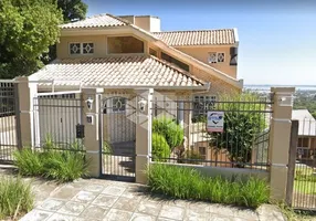 Foto 1 de Casa com 3 Quartos à venda, 363m² em Vila Nova, Porto Alegre