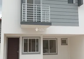 Foto 1 de Sobrado com 2 Quartos à venda, 74m² em Ambrósio, Garopaba