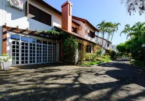 Foto 1 de Casa de Condomínio com 4 Quartos à venda, 318m² em Pedra Redonda, Porto Alegre