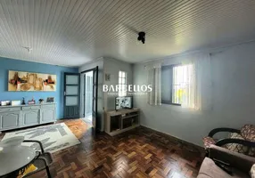 Foto 1 de Casa com 4 Quartos à venda, 130m² em Jardim Leopoldina, Porto Alegre