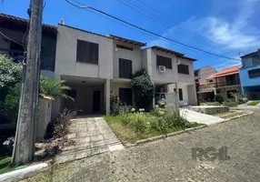 Foto 1 de Casa de Condomínio com 3 Quartos para alugar, 167m² em Guarujá, Porto Alegre