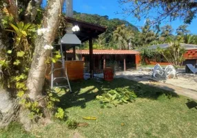 Foto 1 de Casa de Condomínio com 5 Quartos para venda ou aluguel, 400m² em Balneário Praia do Perequê , Guarujá