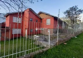 Foto 1 de Casa com 5 Quartos à venda, 185m² em Chácara das Pedras, Porto Alegre