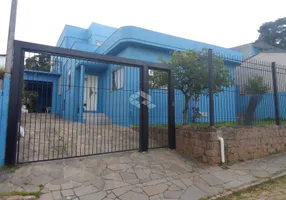 Foto 1 de Casa com 4 Quartos à venda, 545m² em Vila Nova, Porto Alegre