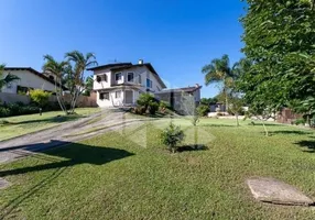 Foto 1 de Casa com 3 Quartos para alugar, 353m² em Vila Nova, Porto Alegre