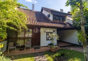 Foto 1 de Casa de Condomínio com 3 Quartos à venda, 220m² em Ipanema, Porto Alegre