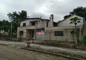 Foto 1 de Casa com 5 Quartos à venda, 150m² em Jardim Carvalho, Porto Alegre