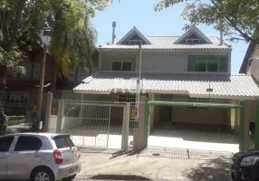 Foto 1 de Sobrado com 4 Quartos à venda, 244m² em Jardim Itú Sabará, Porto Alegre