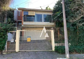 Foto 1 de Casa com 3 Quartos à venda, 231m² em Santo Antônio, Porto Alegre