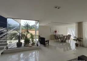 Foto 1 de Casa de Condomínio com 5 Quartos para alugar, 660m² em Barra da Tijuca, Rio de Janeiro