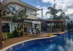 Foto 1 de Casa com 4 Quartos para alugar, 340m² em Jurerê Internacional, Florianópolis