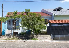 Foto 1 de Casa com 3 Quartos à venda, 211m² em Vila Nova, Porto Alegre