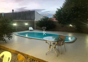 Foto 1 de Casa com 4 Quartos à venda, 247m² em Carianos, Florianópolis