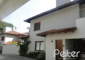 Foto 1 de Casa de Condomínio com 4 Quartos à venda, 299m² em Jardim Isabel, Porto Alegre