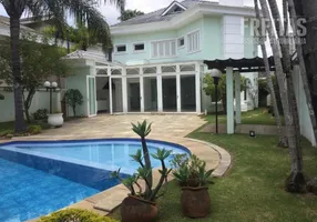 Foto 1 de Casa de Condomínio com 4 Quartos para venda ou aluguel, 450m² em Alphaville, Santana de Parnaíba