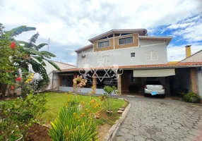 Foto 1 de Sobrado com 4 Quartos à venda, 10m² em Jardim Aruã, Caraguatatuba