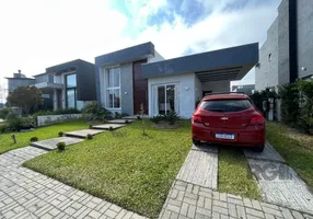 Foto 1 de Casa de Condomínio com 3 Quartos à venda, 134m² em Capao da Canoa, Capão da Canoa