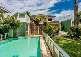 Foto 1 de Casa de Condomínio com 5 Quartos para alugar, 566m² em Barra da Tijuca, Rio de Janeiro