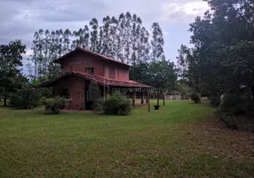 Foto 1 de Fazenda/Sítio com 4 Quartos à venda, 280m² em Zona Rural, Rochedo