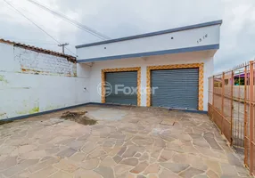 Foto 1 de Casa com 6 Quartos à venda, 250m² em Vila Nova, Porto Alegre