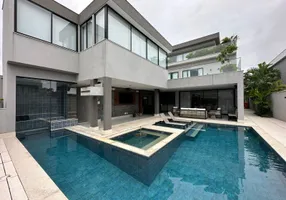 Foto 1 de Casa de Condomínio com 5 Quartos para venda ou aluguel, 850m² em Barra da Tijuca, Rio de Janeiro