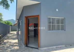 Foto 1 de Casa com 2 Quartos à venda, 60m² em Massaguaçu, Caraguatatuba