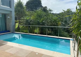 Foto 1 de Casa de Condomínio com 4 Quartos à venda, 390m² em Barra da Tijuca, Rio de Janeiro